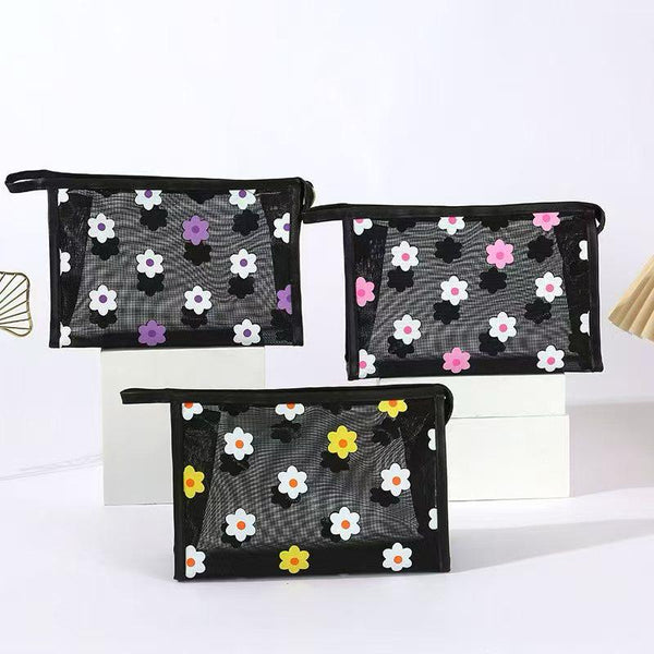 Cosmetiquero con diseño de flores